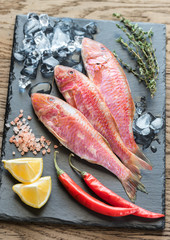 Raw red mullet with ingredients