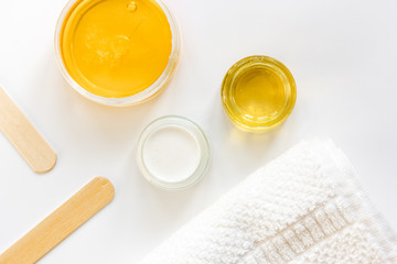 concept depilation with wax on white background top view