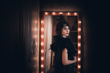 Beautiful  woman, portrait in retro style .  Old photo. Vintage toning.
