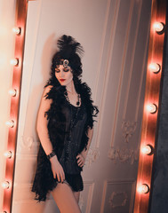 Beautiful  woman, portrait in retro  style .  Old photo. Vintage toning.