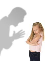 father or teacher shadow screaming angry reproving young sweet little schoolgirl or daughter