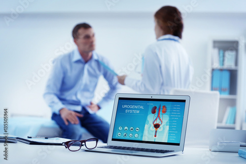 Medical Concept Laptop With Urology Image On Doctor S Desk