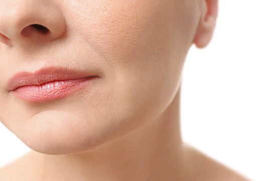 Mature woman face, closeup. Plastic surgery concept.