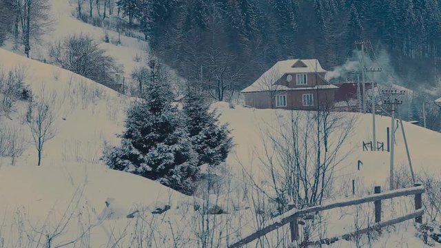 Winter. Сottage in a beautiful snow forest. Time lapse