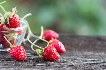 Fresh strawberry on wooden background