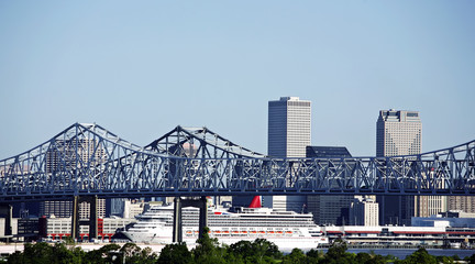 Cityscape of New Orleans, Louisiana, Mississippi bridge and cruise ship