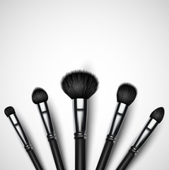 Set of makeup brushes on white background