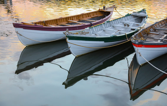 Trio of wooden brow boats