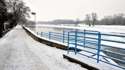 Wideangle view of Ivan Krasko Riverbank and river Vah in Piestany, Slovakia during winter season