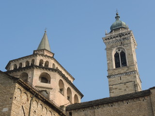 Fototapeta na wymiar Bergamo - Old city (Citta Alta). One of the beautiful city in Italy. Lombardia. The bell tower and the dome of the Cathedral called Santa Maria Maggiore, north wing