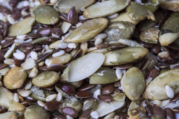 a variety of sesame pumpkin and flax seeds close