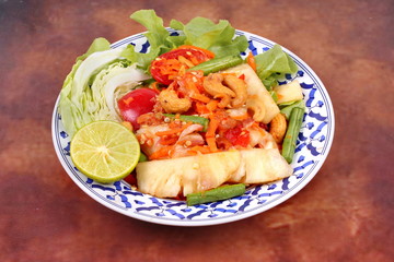 Fototapeta premium Spicy and sour vegetable salad with pineapple .