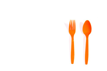 Plastic utensils on white background
