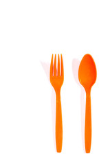Plastic utensils on white background
