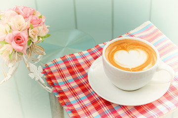coffee latte art in vintage color tone filter