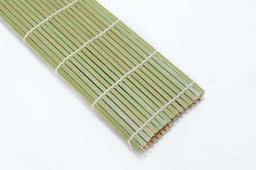 green bamboo place mat isolated on white background