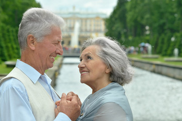 mature couple on  in summer park