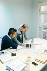 Colleagues at laptop