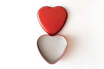 Red heart shape symbol opened tin can