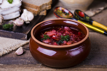 borsch soup and garlic on the table
