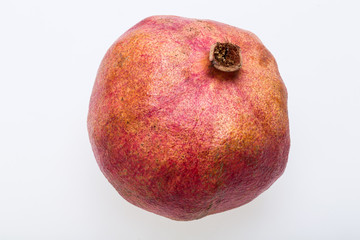 red pomegranate isolated on a white background