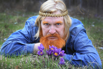 portrait of a man in a meadow