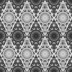 Colorful floral seamless pattern from different rhombus with mandala in patchwork boho chic style, in portuguese and moroccan motif
