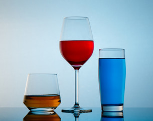 drinks in various alcoholic glasses