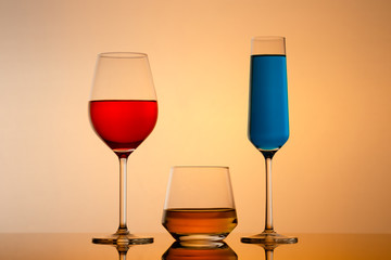 drinks in various alcoholic glasses