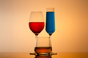 drinks in various alcoholic glasses