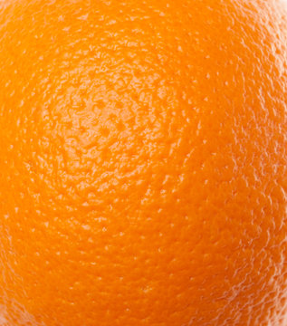 orange peel texture, bumpy surface of an orange