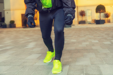 Urban jogger exercising outdoors.