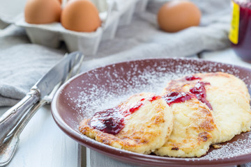 Cottage Cheese Pancakes with Raisins and Berry Jam, Horizontal View