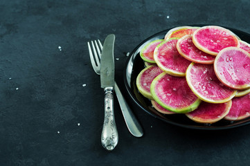 Salad of radish and vegetable oil with salt