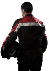Man wearing a protective leather and textile racing suit for race cars and motorcycle motor sports.  The gear is armored with a helmet and worn by bikers and professional drivers. © Innovated Captures