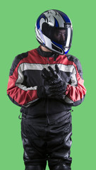 Male wearing protective leather and textile suit for racing race cars or motorcycles.  The armor is worn in professional motor sports.  The man is on a green screen or chroma key background. © Innovated Captures