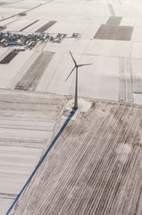 aerial view of wind turbine on a field