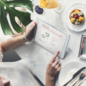 Young Woman Shopping Online Concept