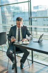 Young businessman sitting in office