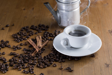 white cup with old Neapolitan coffee