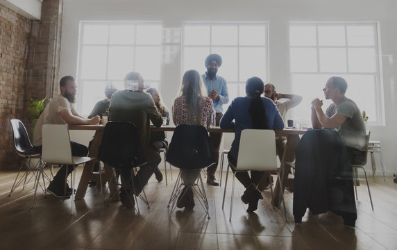 Diverse people teamwork on meeting table