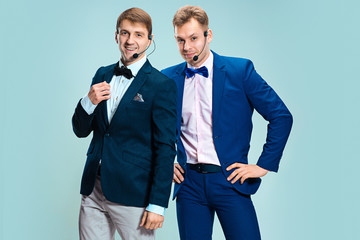 Portrait of a handsome customer service operator wearing a headset