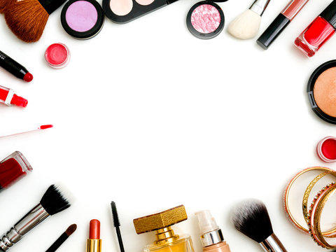 cosmetics top view on a white table. Workplace, cosmetics, lipstick, nail Polish, mascara and eyeshadow