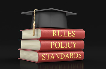 Stack of compliance and rules books. Image with clipping path 