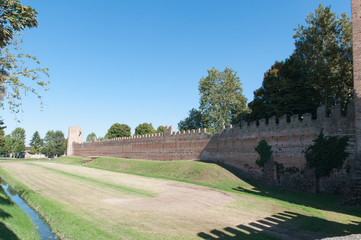 Walking along the street of the old village