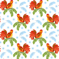 fire cock on the branch of spruce