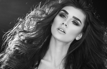Close up portrait of beautiful woman with volume healthy hair