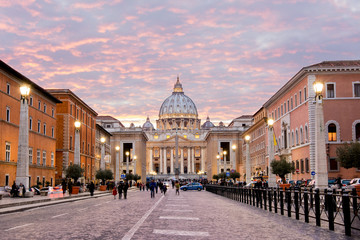Sunset on Saint Peter, Vatican, in Rome. Red clouds on the sky
