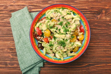 Low carbs Tuna Avocado Salad in glass bowl.