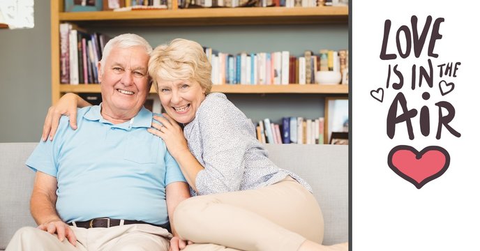 Happy senior couple relaxing in bed